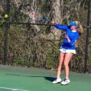 Malia O'Connor returns a hit. 