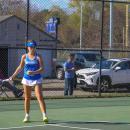Yvonne Pina-Monteiro prepares to serve. 
