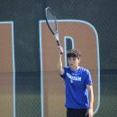 Chase Card watches his opponent after a hit.