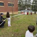 Fire! Students help put out fake fires with Wareham Fire Department.
