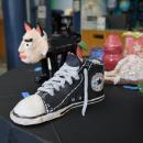 A sculpture of a converse shoe created by Ryan Dame
