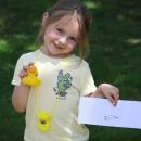 Kamryn Lyons shows off her winning duck.