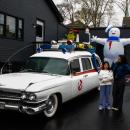 PINKLIDS makes a pit stop. Lead singer Amber Lawson, left, and her little sister with the ghost busters vehicle. 