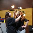 Abigail Balano, left, puts a wig on Lilyan Medina, who plays Cady Heron. Photos by Nick Mossman
