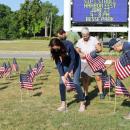 State Sen. Kelly Dooner pokes hole for flag