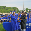 Abigal Balano was quite excited to receive her diploma from Lisa Ohman. 