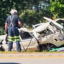 A crashed into a guardrail and rolled over into the median near mile marker 2.7 on Monday, July 13. Photo by David Curran