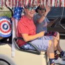 Kevin Legault and Joe Legault rode in a decorated golf cart in the parade. 