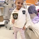 Mia wears patches gifted by the Abington Police Department. The community has come together in different ways to show support for the young girl. “Community is so strong, and there is good in people. Things like this really bring out that good in people,” Lunettasaid.