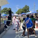 Festival-goers dance with John Miranda during his performance. Photo by Christian Uva