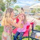 Addilynn McIntyre, 6, gets her face painted. Photo by Christian Uva