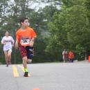 Noah Brilliant of Plymouth approaches the finish line in the 2017 Lazy Lobster Road Race. Photo by Matthew Bernat