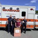 Ainslee Manduca brings stuffed animals she collected to local emergency medical technicians. Submitted photo