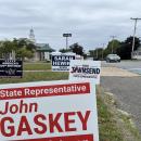 Signs for state representative candidates near Wareham Town Hall, one of the town's three polling locations. Photo by Christian Uva