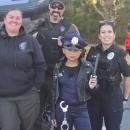 Genasis Gumbs wants to be a police officer one day like her grandfather, Sergeant Nick Fernandes. Photo source: Gena Gumbs