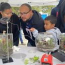 Rick Lepel displayed his terrariums, inviting people to get a closer look.