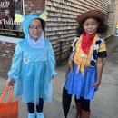 Victoria Perry, 7, and Harmony Lina-Howard, 8, show off their costumes. 