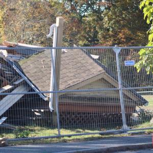 Part of the roof remained after the structure had toppled. Photo by Brandy Muz