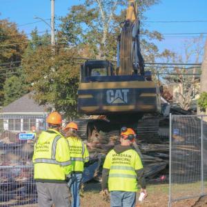 Wareham Municipal Maintenance looks on into the demo. Photo by Brandy Muz Wareham Municipal Maintenance looks on into the demo. Photo by Brandy Muz