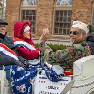 Former Grand Marshall Julio Roderick waves to the crowd.