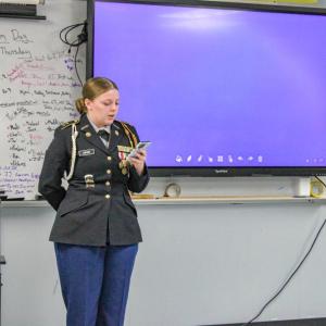Speaking on her time with the JROTC Ava talks to her peers.