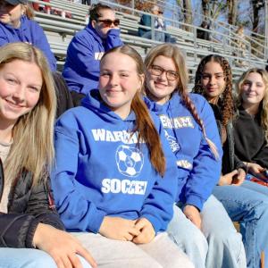 A group of Wareham fans in the stands donned in blue and white.