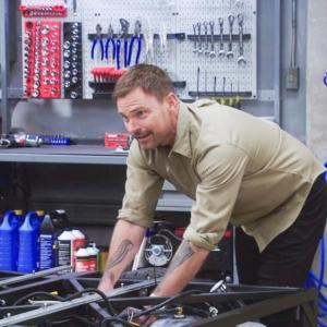 Seann William Scott works on the Factory Five truck. Photo source: ABC