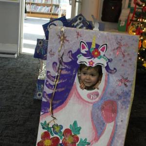 Morgan Sousa showing unicorns are real at the library.