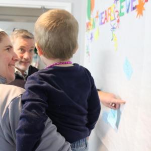 Resolutions were stapled to the wall.