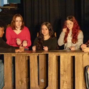 Smack dab in a final celebration, Evelyn Medina is Tiny Tim.