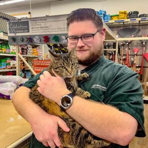 Manager Dan Carneiro and Cinder, best friends fur-ever. Photos by Brandy Muz