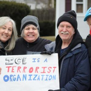 Maria and Ed in the center gathered with friends.