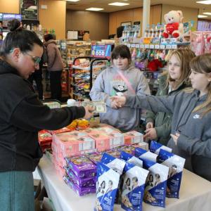 The group receives a sale from a customer.