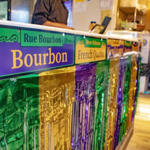 New Orleans decorations at the front counter.