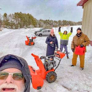 Staff clear Wareham Elementary while students enjoy a snow day. Photo source:  M Skolnik 