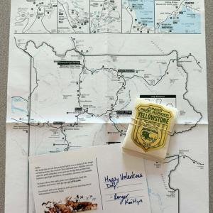 A map and ranger badges sent from a National Park ranger in Yellowstone.