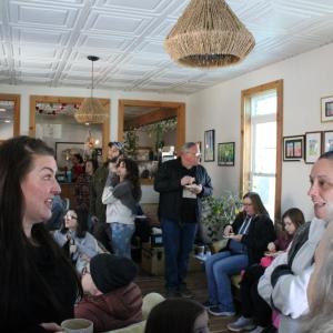 The reception was full of art enjoyers.