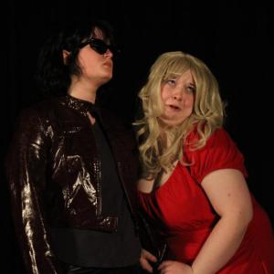 Lily Medina, a biker, protecting Abby Balano, Baylor Twift.