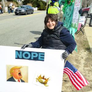 Mary Stanton holds up her sign. 