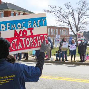Many protestors held handmade signs. 