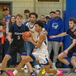 Monteiro makes a break towards the net. 