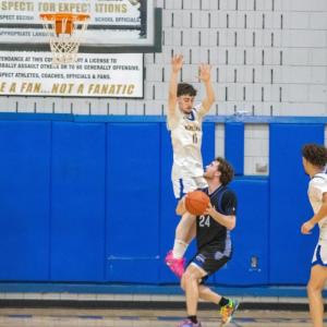 Robbie Orne blocks a shot. 