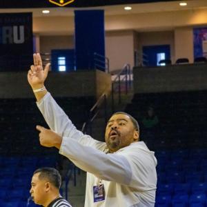 Head Coach Steve Faniel directs his players.