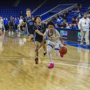 Malikhi Tavares goes for a last second shot.