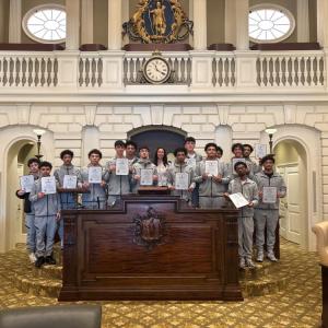 The team with Dooner on the house floor. Photos source: Wareham High School
