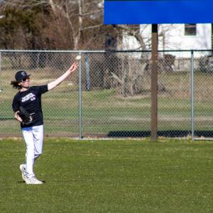 Brayden Pease pitches the ball back to Coach Cabe.