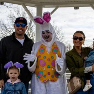 Kinsley and baby Avery with the easter bunny and their parents. 