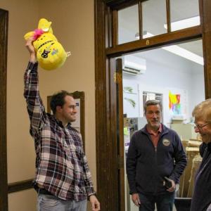 Josh Faherty holds up his prize.