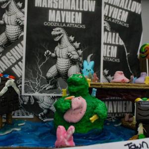 Godzilla makes a mess of Main Street.