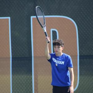 Chase Card watches his opponent after a hit.